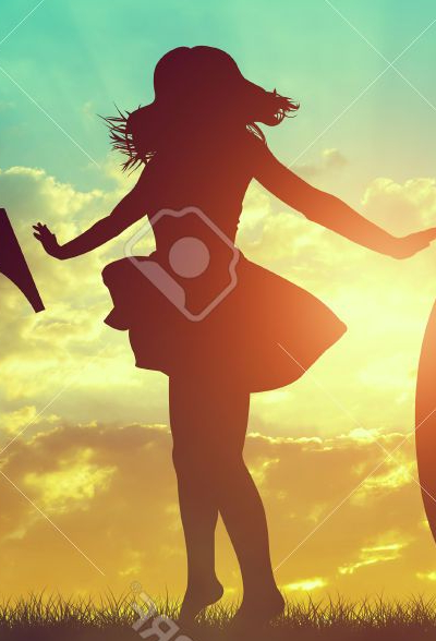 67169583-silhouette-of-a-happy-girl-dancing-in-celebration-of-the-new-year-2017-at-sunset-stock-photo